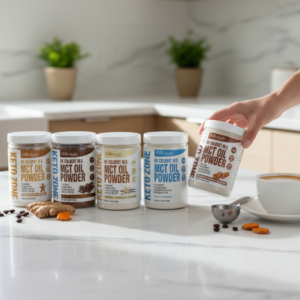 Keto Zone MCT Oil Powder jars on kitchen counter beside a cup of coffee