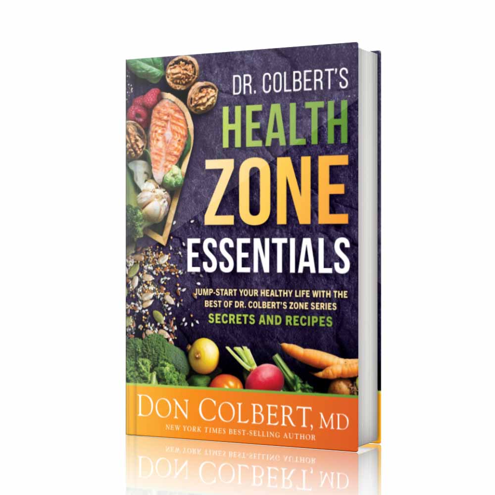 Hardcover book Dr. Colbert’s Health Zone Essentials by Dr. Don Colbert, MD featuring a vibrant cover with whole foods including salmon, vegetables, nuts, seeds, and healthy ingredients representing balanced nutrition and the Divine Health lifestyle. This wellness book introduces the foundational principles of Dr. Colbert’s Health Zone system, focusing on nutrition, gut health, and metabolic wellness. The guide explains how whole foods and healthy lifestyle habits can support digestive balance and the microbiome, highlighting the role of probiotics and fiber supplements for gut health. It also aligns with modern nutrition strategies that may include collagen powder for structural support and MCT oil powder for clean metabolic energy. Designed as a practical Divine Health resource, the book helps readers develop sustainable habits that improve digestion, increase energy, and support overall health and vitality.