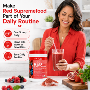 Latina woman mixing Divine Health Organic Red Supremefood into a red drink as part of her daily wellness routine