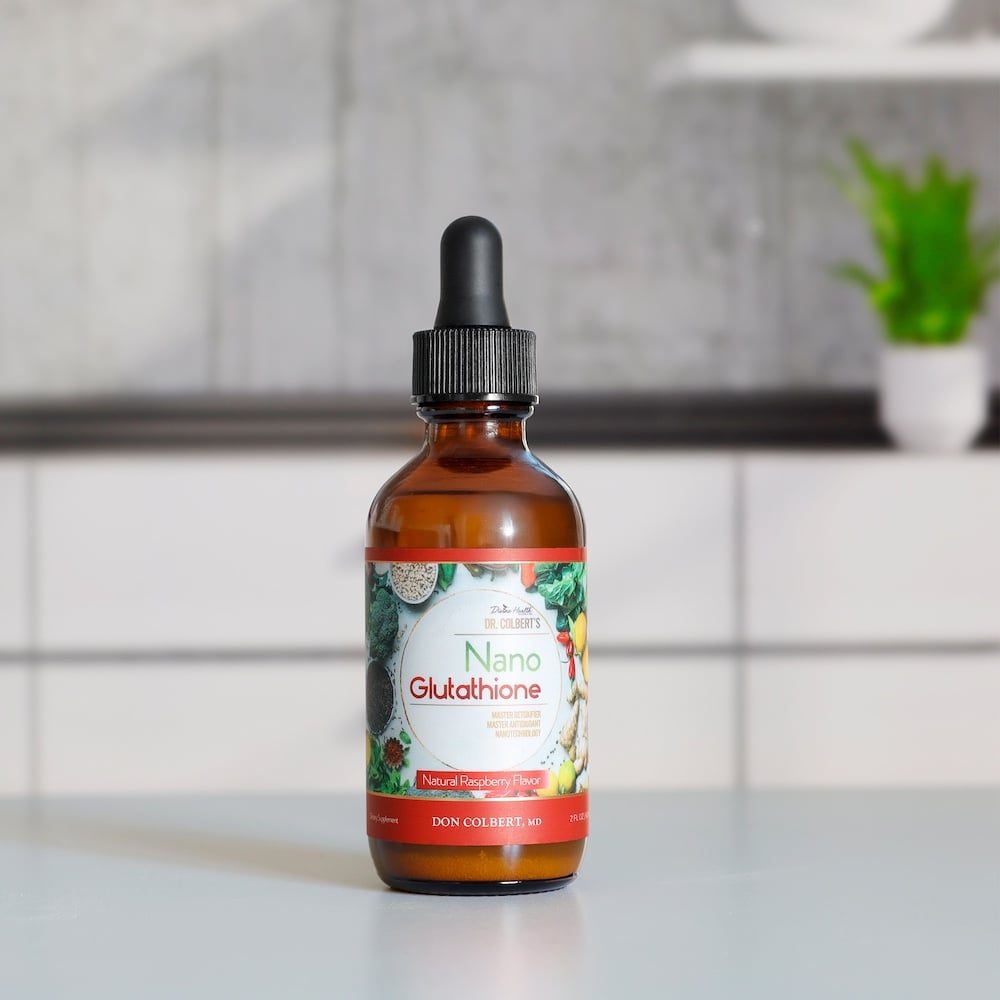 Divine Health Nano Glutathione Drops 30 Servings by Dr. Colbert on a white background supports cellular defense cardiovascular health energy immune function skin clarity brain health and provides broad-spectrum antioxidant support for overall wellness