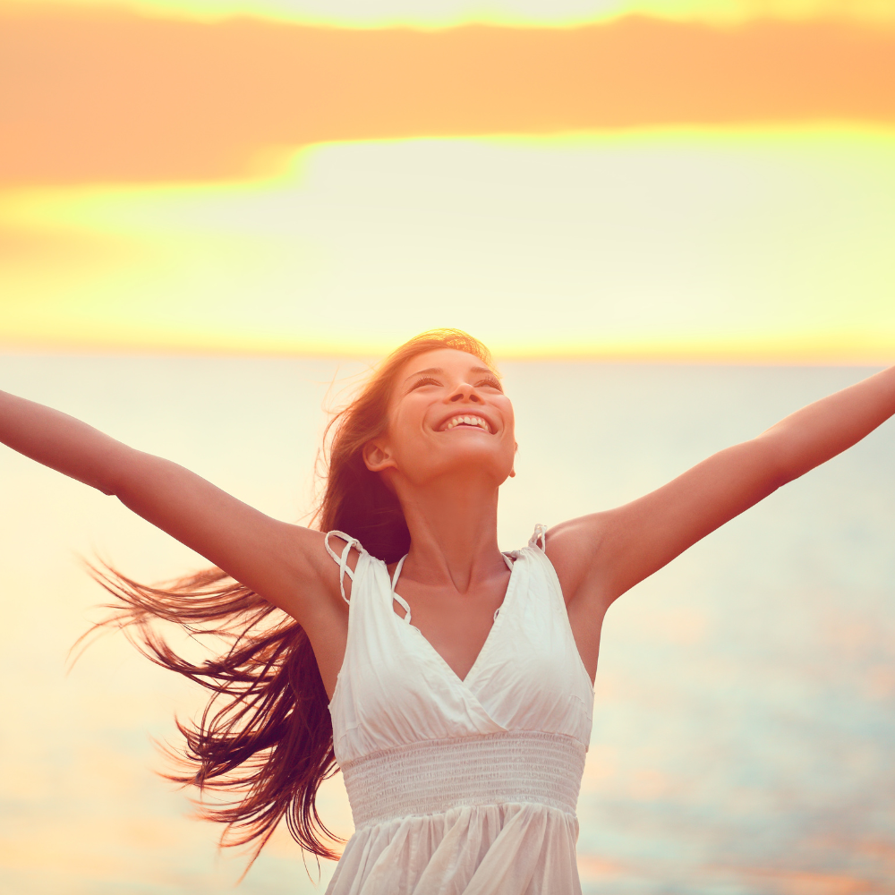 Woman lifting arms in joy symbolizing renewed faith and answered prayer from Prayer That Changes Everything book
