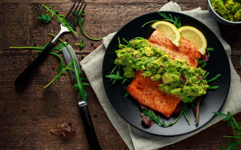 Roasted salmon fillet topped with fresh guacamole