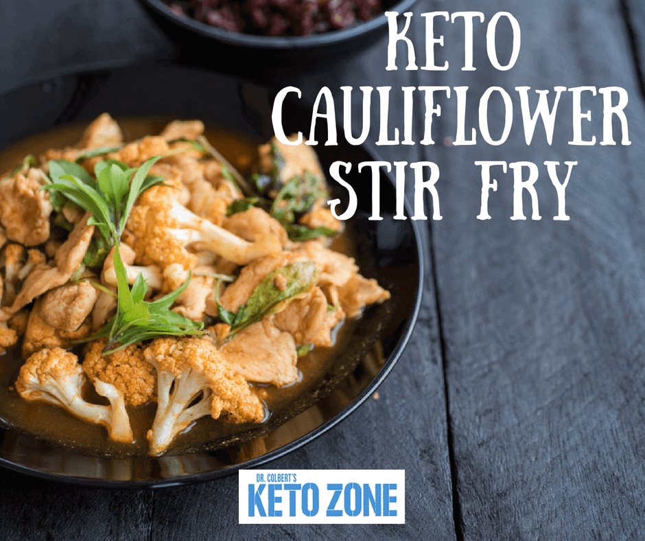 Keto cauliflower and chicken stir-fry with scallions in a pan