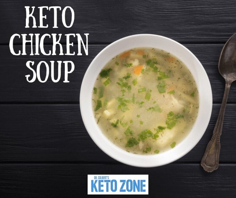 A bowl of keto chicken noodle-less soup with cabbage, carrots and shredded chicken