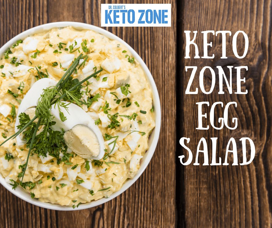 Keto egg salad with sauerkraut and fresh herbs in a bowl, a low carb high fat lunch