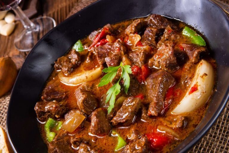 A bowl of keto goulash soup with grass-fed beef, peppers and celery root